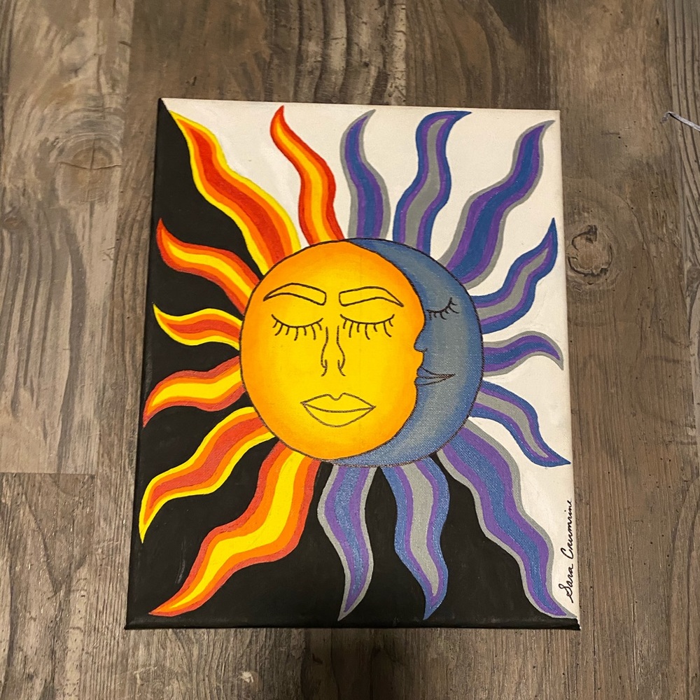 Split sun and moon painting